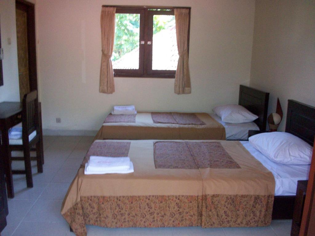Hotel Petit Boo Amed Habitación foto